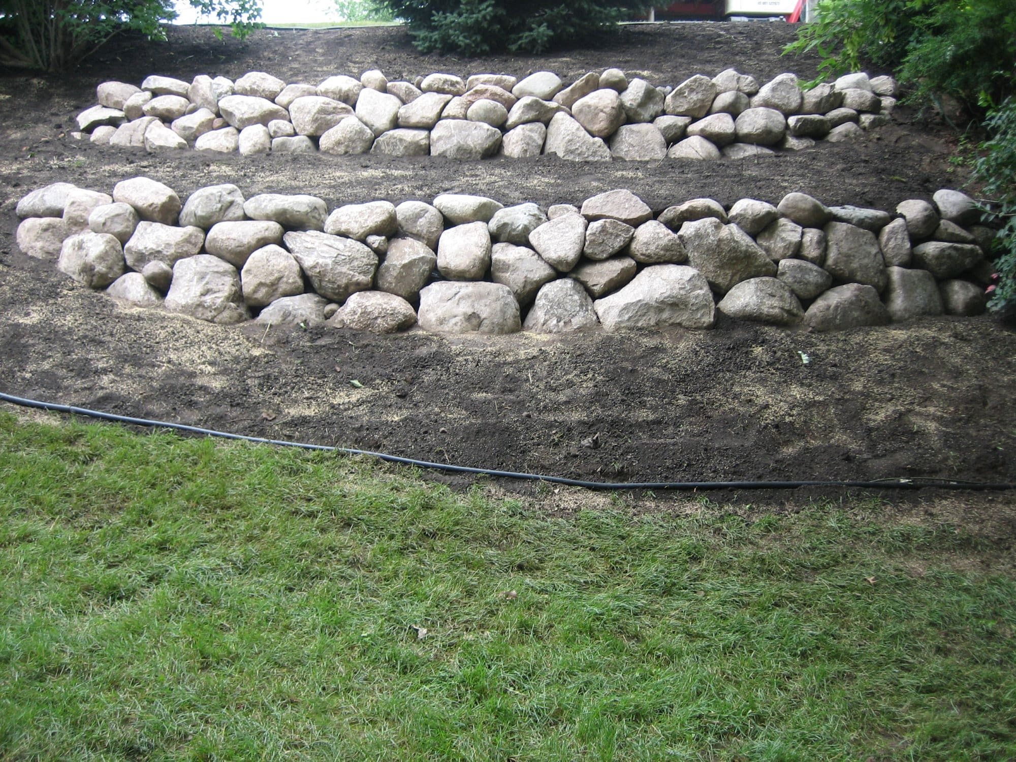 Fieldstone Boulder Wall Installed