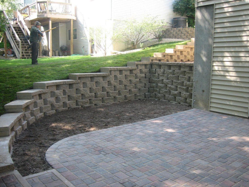 Retaining Wall with Caps and a Paver Patio installed in ...