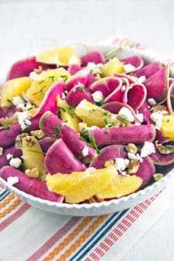 Watermelon radish, clementine and spinach salad