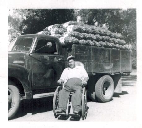 Leo with a truck full of onions ready to go to the farmer’s market. 