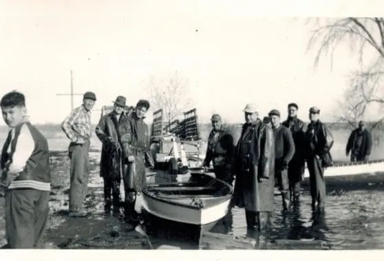  1951 Bloomington fire department coming back from towing a barn back to the farm that floated away and they tied the barn to a tree.