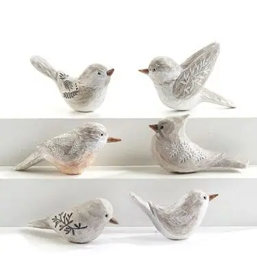 CARVED CERAMIC BIRD